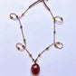 Collier Court Tibétain Rubis - Sharing